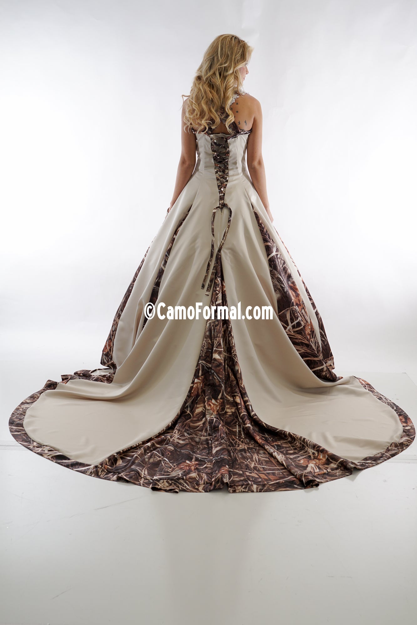 Design Your Own from photos on file.  Request Price Quote via email to info@camoformal.com